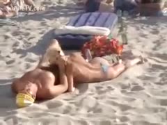 Hot pair enjoying blow job on the beach 